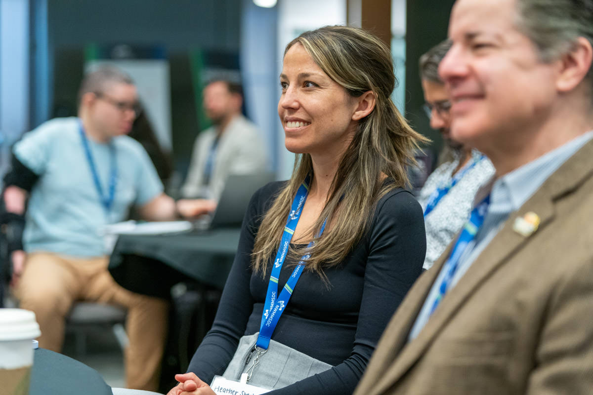 WEB-_A9_2558-Seattle-Event-Photographer-Mike-Nakamura-Photography Diverse group of businesspeople smiling at the camera