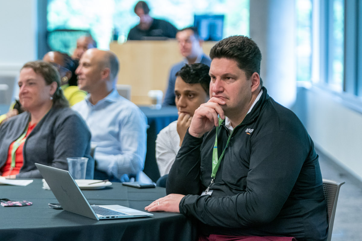 WEB-_A9_2562-Seattle-Event-Photographer-Mike-Nakamura-Photography Diverse group of businesspeople smiling at the camera