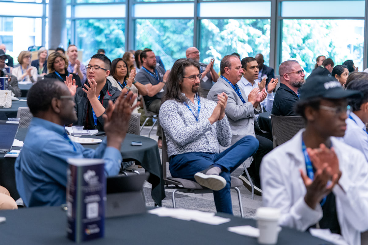 Diverse group of businesspeople smiling at the camera