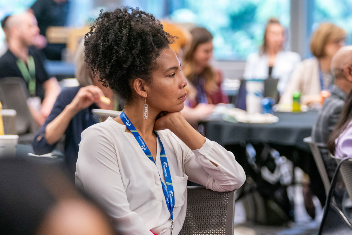 Diverse group of businesspeople smiling at the camera