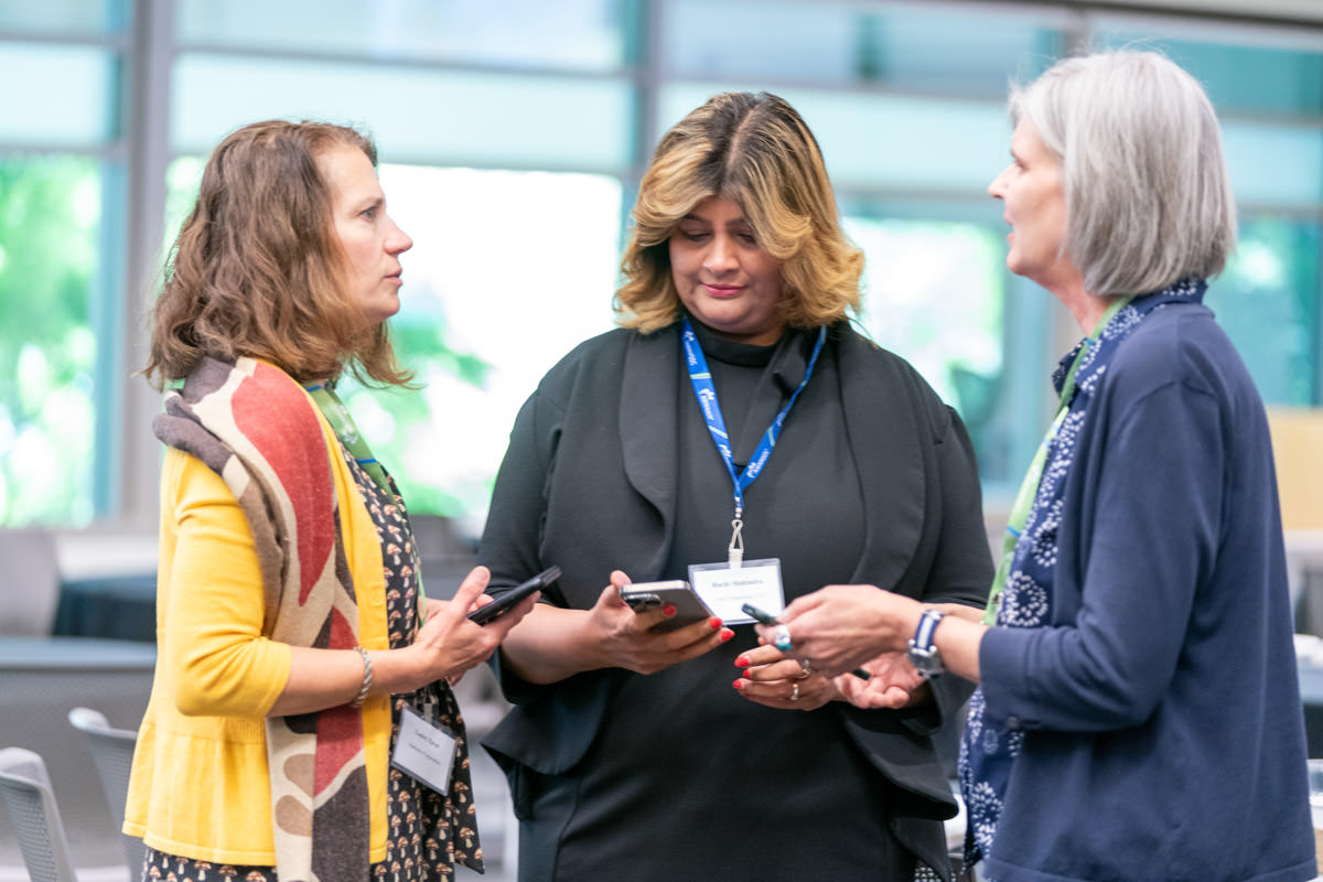 Diverse group of businesspeople smiling at the camera