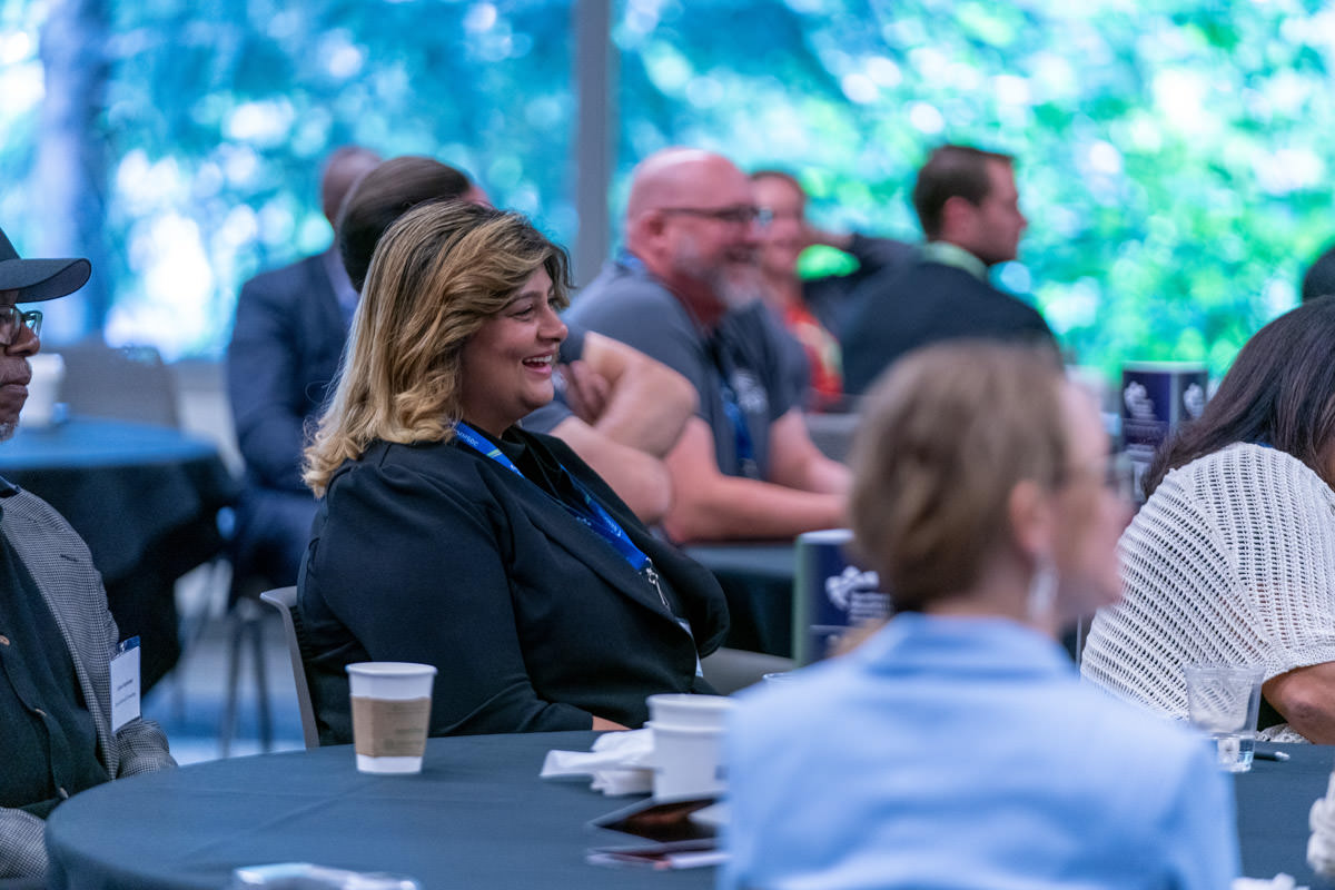 Diverse group of businesspeople smiling at the camera
