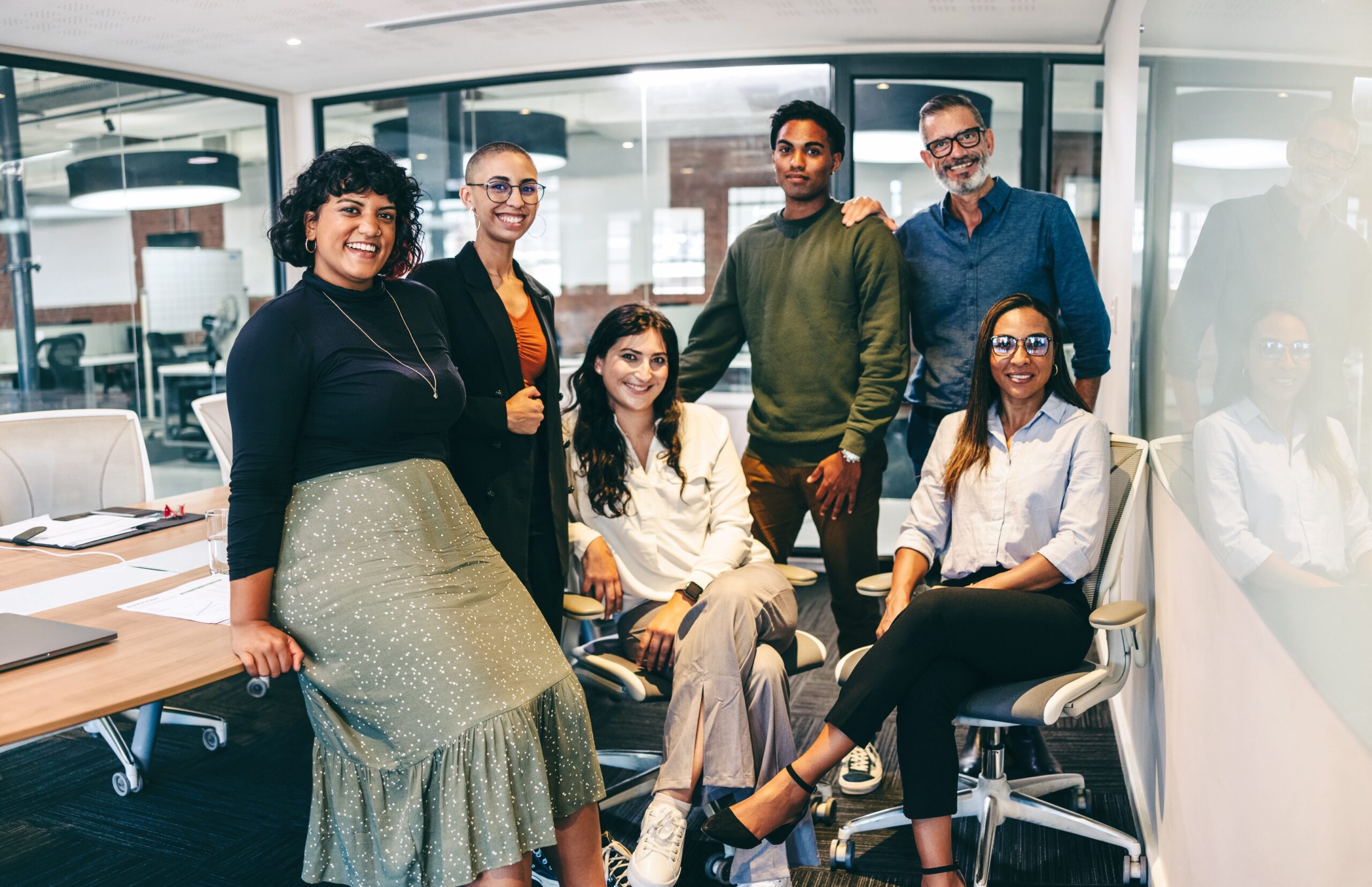 Diverse group of businesspeople smiling at the camera