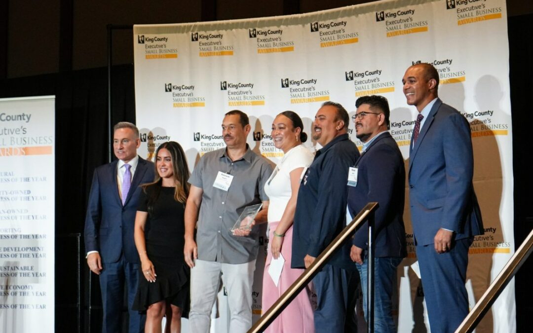 Presenting the Minority-Owned Small Business of the Year award at the King County Executive’s Small Business Awards